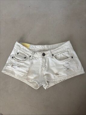 Machine Jeans Nouvelle Mode low rise distressed jean shorts in white